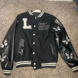 black and white letter L varsity jacket
