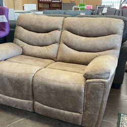 Tan Reclining Loveseat