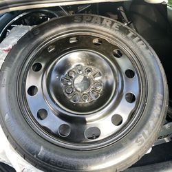 Maxxis T155/70D17 compact spare tire with a black steel rim