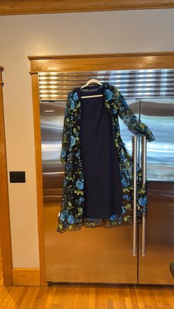 Navy slip dress with embroidered jacket is beautiful blue flowers and geeen leaves