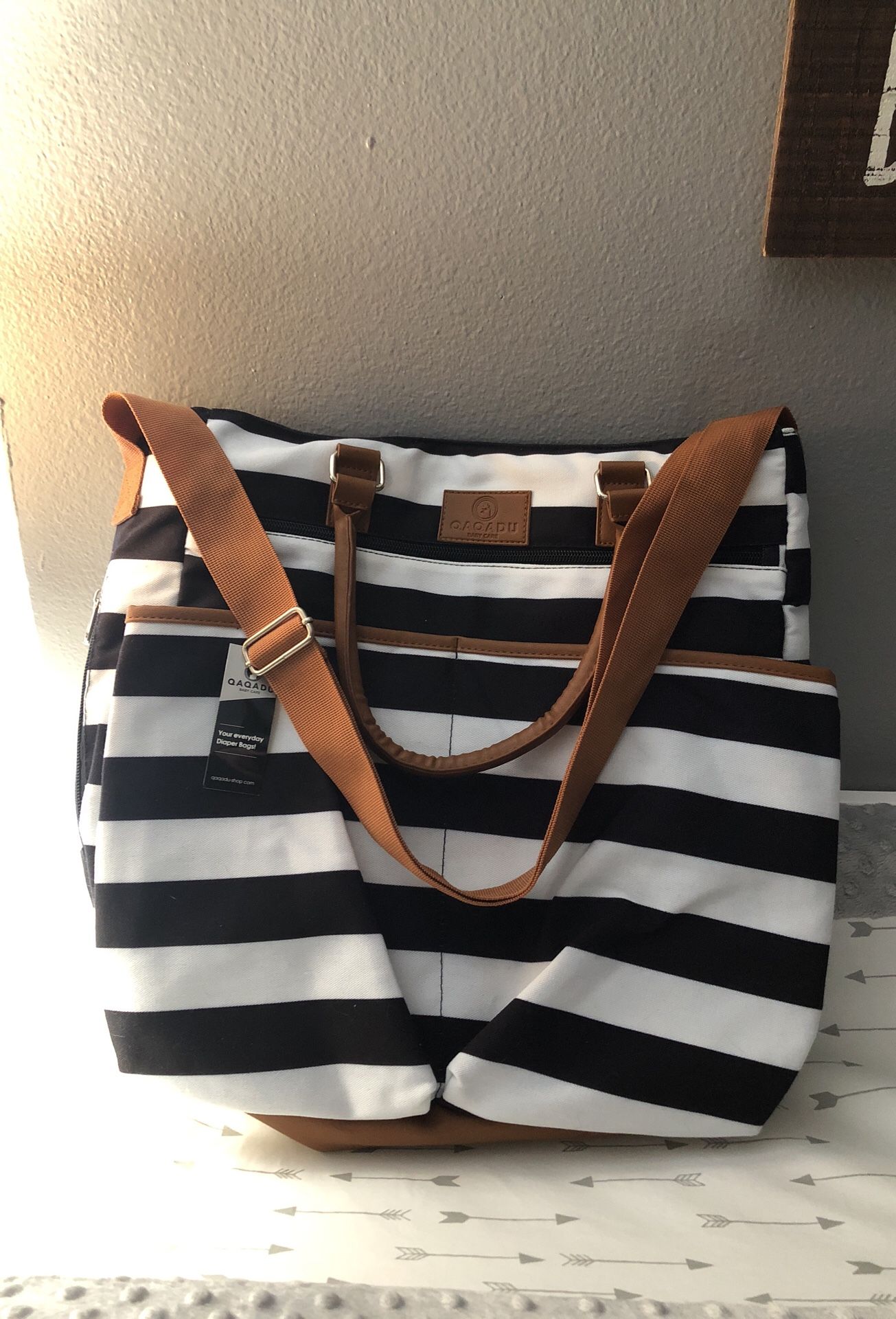 Qaqadu baby care diaper bag tote with changing pad