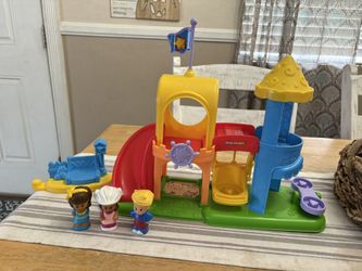 Fisher-Price little people playground with three figures
