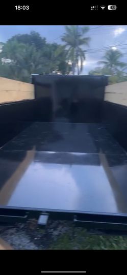 Dump Truck. Let Us Pick Up Your Dump Garbage For You!