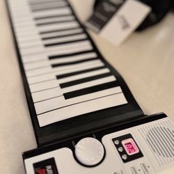 Sharper Image Play N Roll Digital Piano/Keyboard