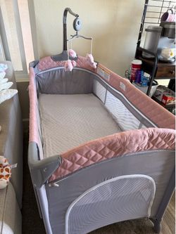 Pink baby pack and play