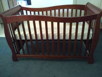 Crib solid wood sleigh with mattress for Sale in Humble, TX OfferUp