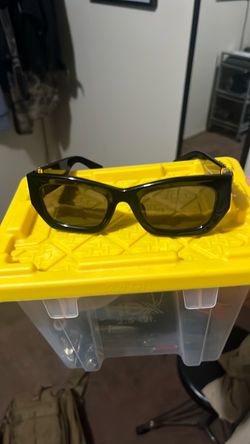 miu miu black with gold letters sunglasses