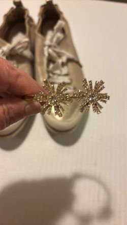 Gold Metallic Leather Lace-Up Sneakers and Golden Bracelet