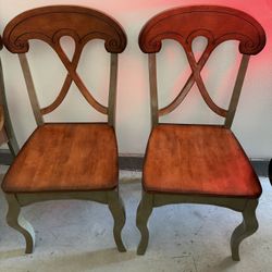 4 brown wooden antique chairs 