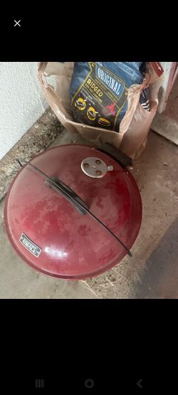 Small Grill And Bag Of Charcoal 