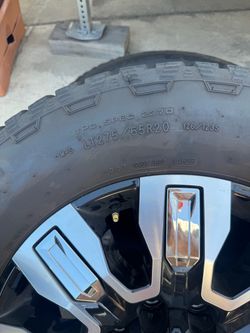 LT275/65R20 Tire on Black Alloy Wheel