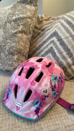 Schwinn kids’ bike helmet in a cute pink floral design
