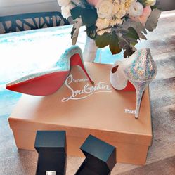 Christian Louboutin Red Bottoms Size 9