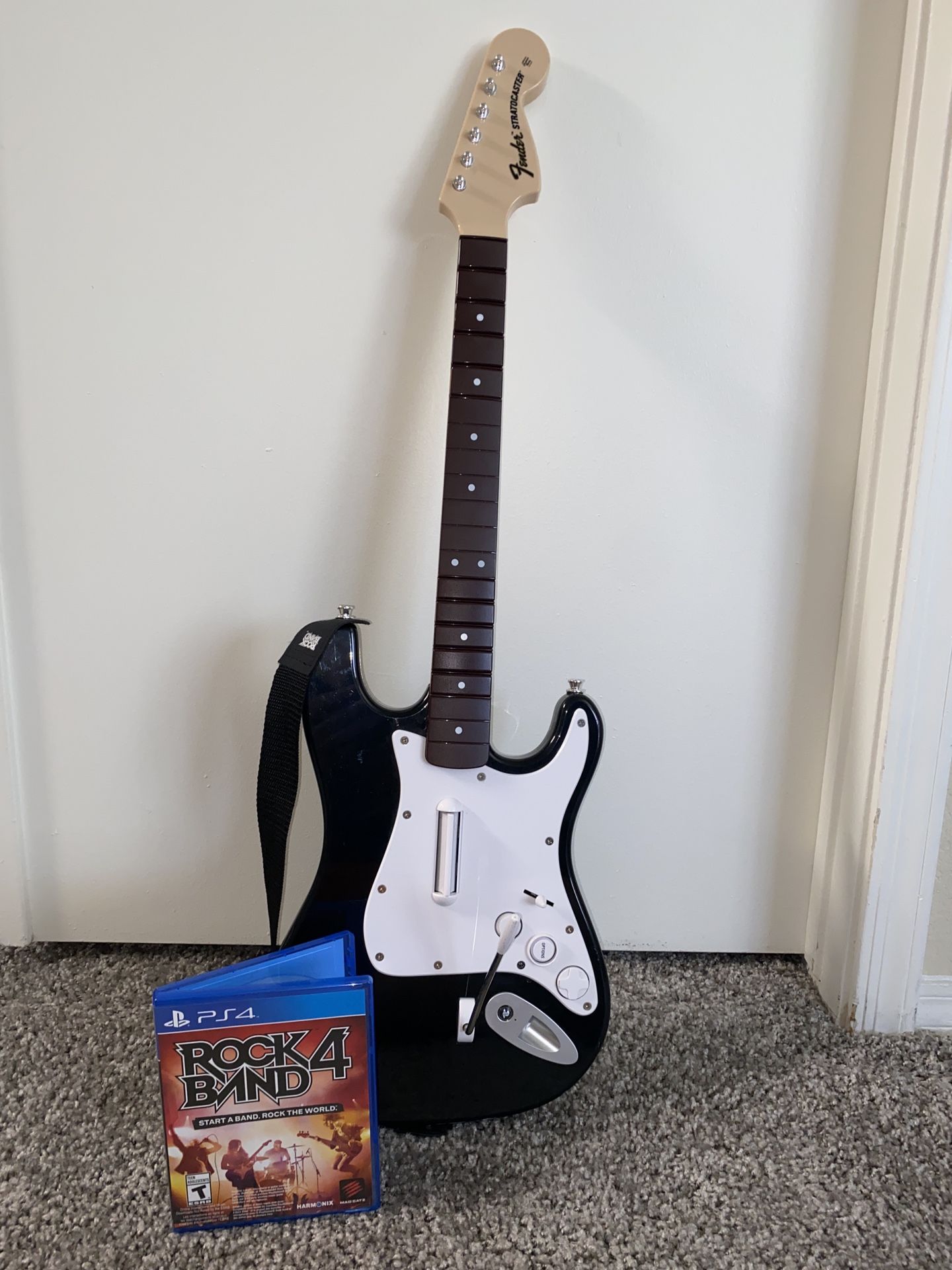 Rock Band 4 (PS4) and Wireless Fender Stratocaster Guitar (91261)