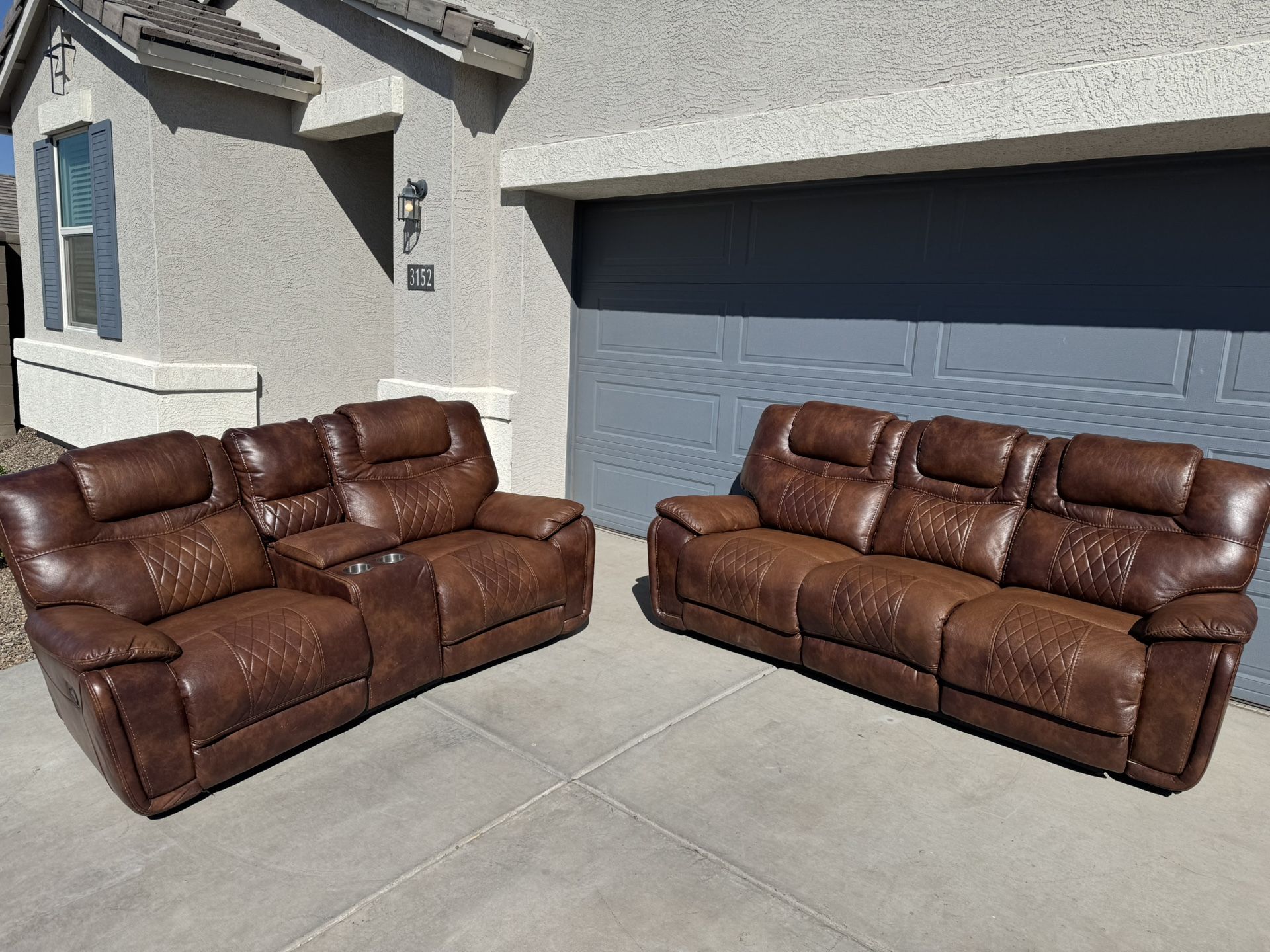 Brown Leather Reclining Couch and Loveseat Set