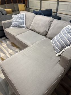 Beige Living Spaces L-Shape Sectional Sofa