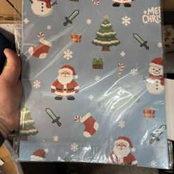 Christmas Wrapping Paper  Festive wrapping paper with Santa and holiday designs.