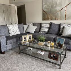 CONTEMPORARY STYLE 2PC. SECTIONAL IN A MULTI FABRIC COMBINATION.