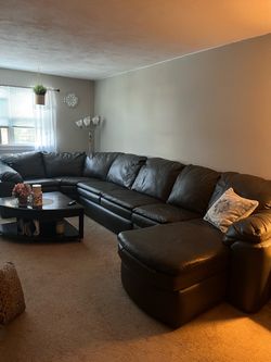Grey Bernie & Phyls Leather Sectional Sofa with Recliner Pickup Only