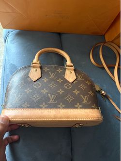 Louis Vuitton bag and bracelet