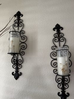Black metal set of four candle wall sconces