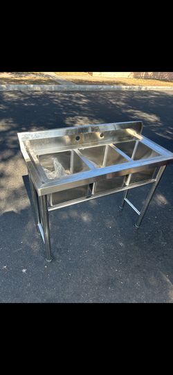 Brand new commercial utility sink three baskets for 120
