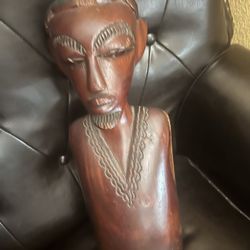 HAND CARVED WOODEN SCULPTURE