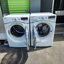 Two gas-powered washing machines in good condition, Whirlpool brand; one washer and one dryer