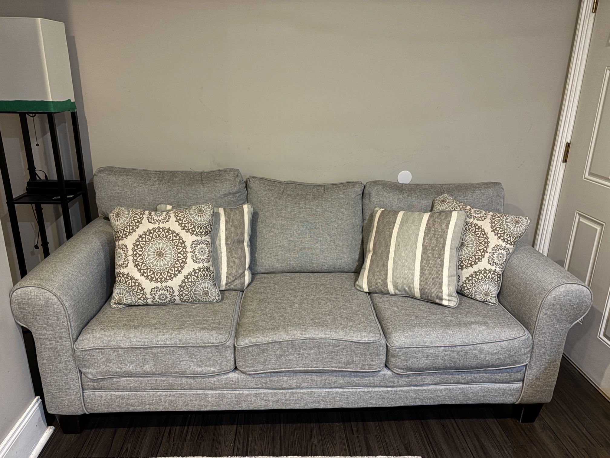 Light blue/grey Couch With 4 pillows