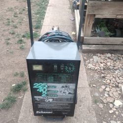 Automotive battery charger/booster