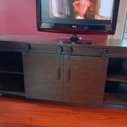 Credenza/TV Stand. Multi-purpose item for family room. Real woo, Duel  drs  enclose inner slide out tray & cabinet space. 73" wd / 30" hi / 19" dp