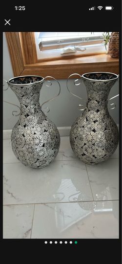 2 matching silver vase decor