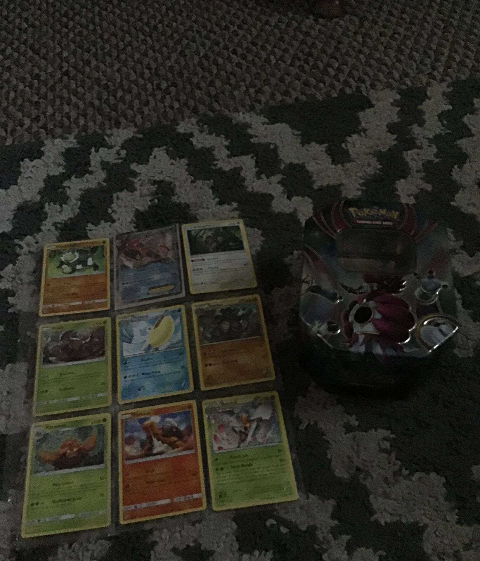 Pokemon tin w/ 18 cards