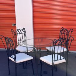 Glass dining room table (4) chairs