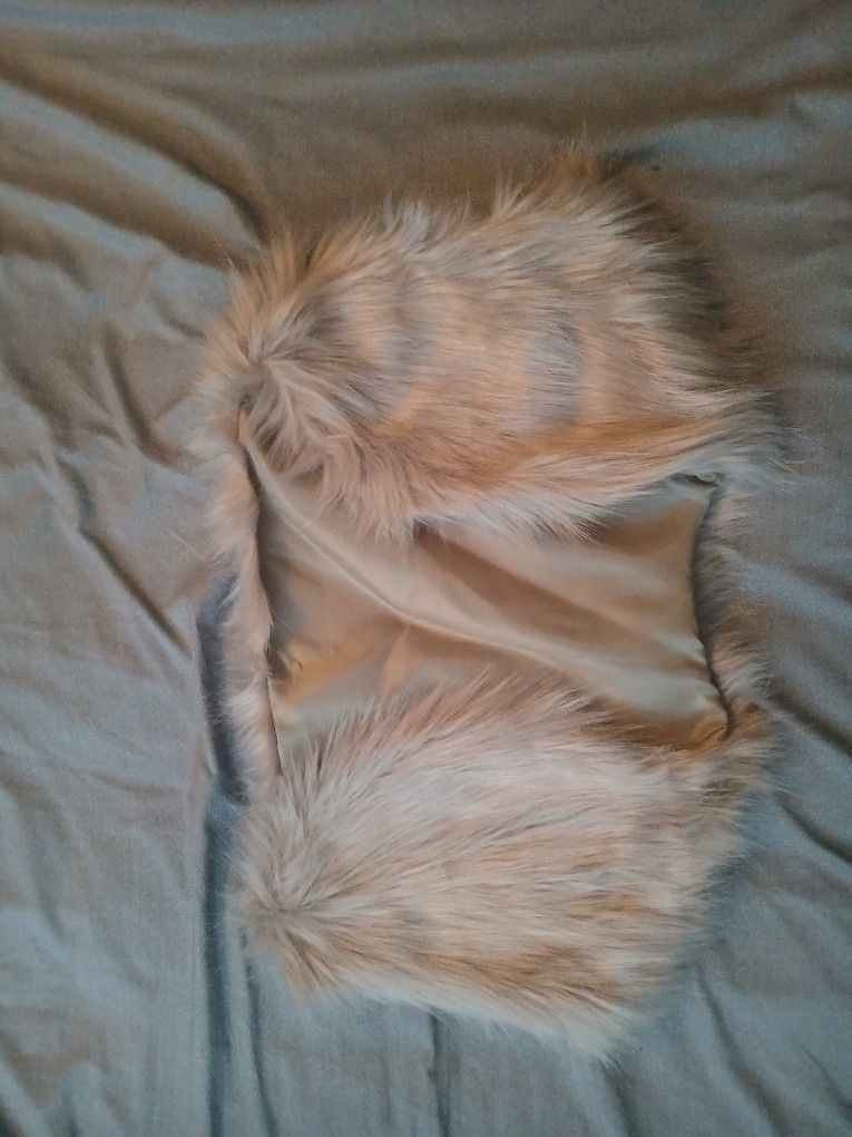 Fur Vest An Fur Moccasins.