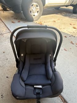 Gently used Nuna infant car seat