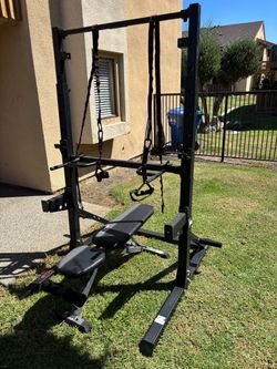 ETHOS Adjustable squat rack with weights bench, straps, pull up bar, safety and j hooks RACK CAN ADJUST UP TO 8.1 ft