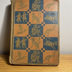 vintage children's book titled "Children's Bookshelf-Playing Together" from 1934