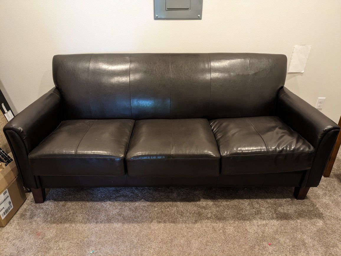 Three seater leather couch