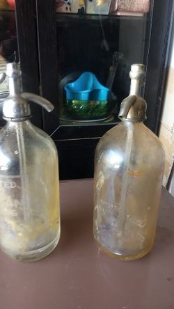 2 old seltzer bottles