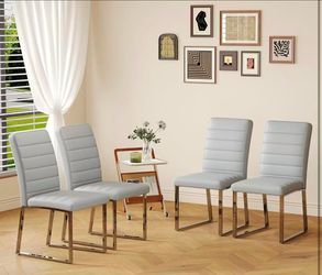 New assembled Modern Dining Chairs Set of 4, Grey Faux Leather Kitchen Chairs, Upholstered Armless Dining Room Chair with Silver Mental Legs Heavy Dut