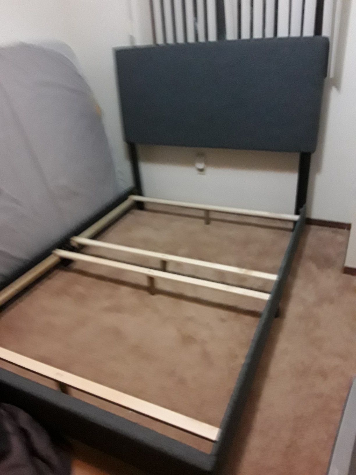 Full size 1 month bed frame.