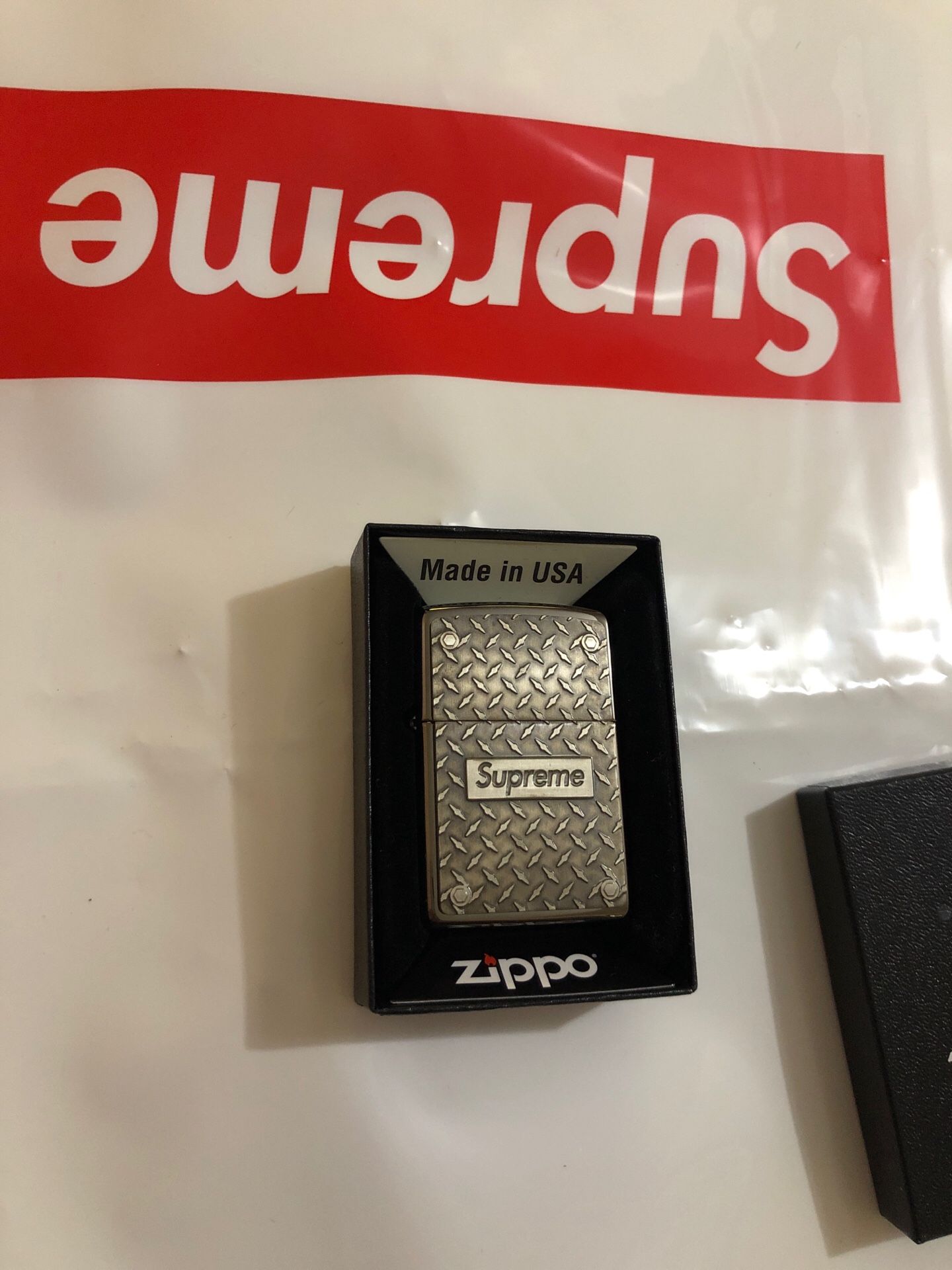 Supreme zippo