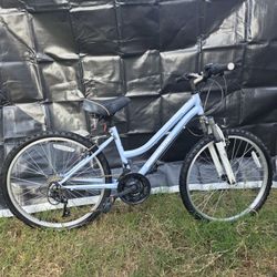 Roadmaster Granite Peak girls' mountain bike with 24-inch wheels. Light Blue 