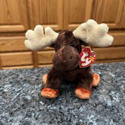 Ty Beanie Babie “Zeus” 2002.  Size  7 inches tall.  Sits  up.  Brand New with Tags has been on display in a cabinet with a Ty beanie Babie collectio