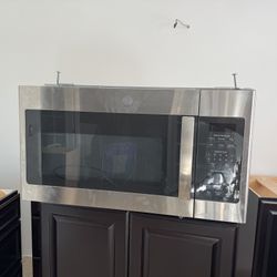GE microwave over the range 30" hood range fan