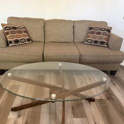 Comfy couch and Glass CoffeeTable