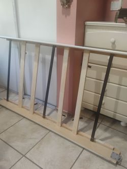 White wood twin bed