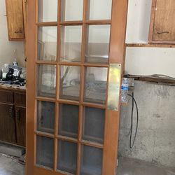 2 identical solid wood doors