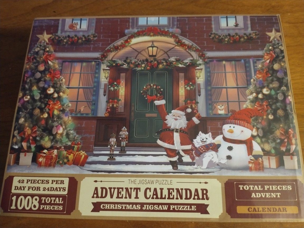 1008 piece jigsaw puzzle Christmas Advent calendar 42 pieces per day for 24 days *new*

dancing cartoon Santa 